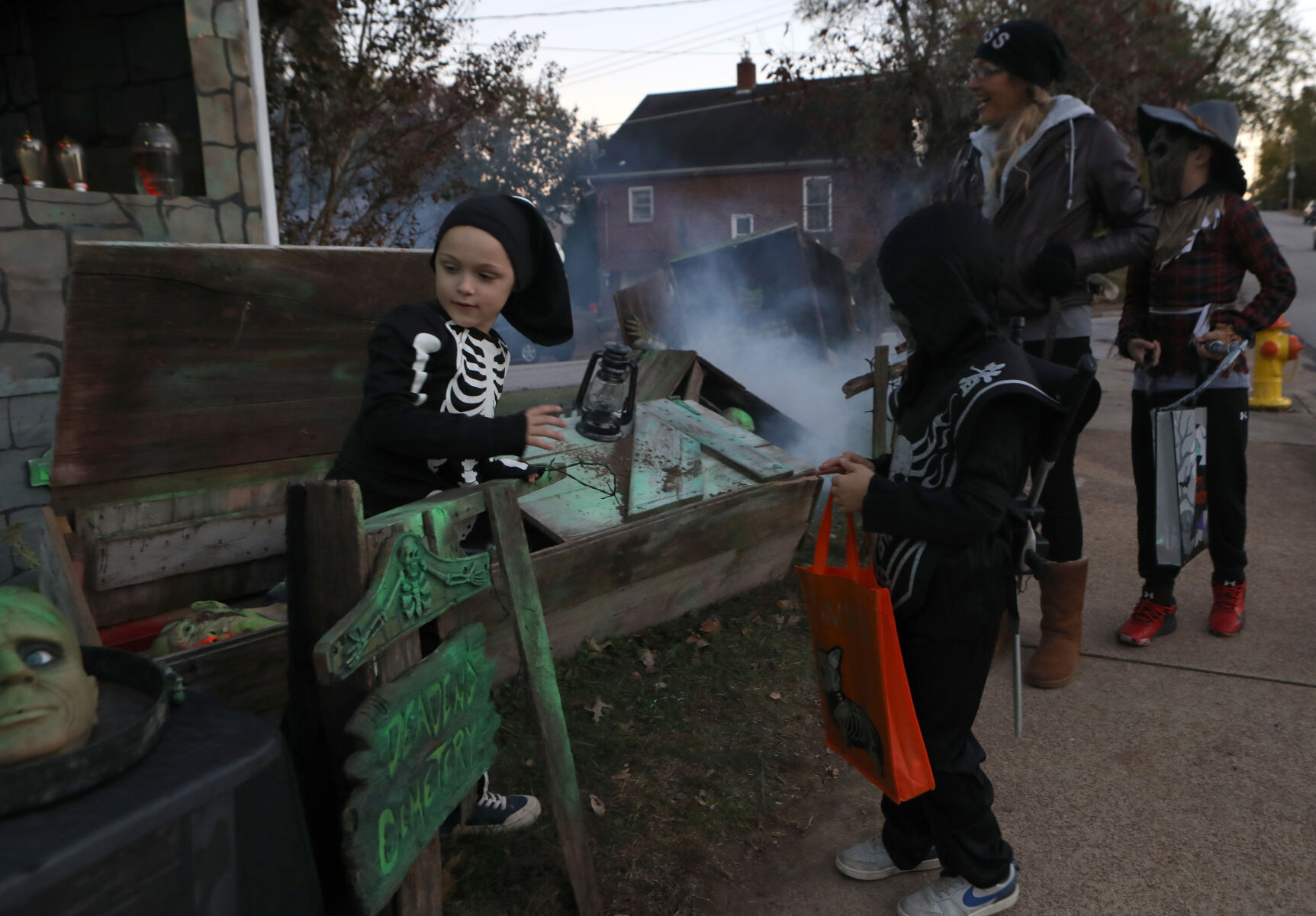 Christopher Montalbano hands out candy